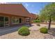 Charming home featuring a covered patio and easy to maintain desert landscaping at 1407 Wheelwright Ct, Mesquite, NV 89034