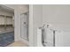 Bathroom featuring glass-enclosed shower, walk-in tub, and doorway to closet at 1407 Wheelwright Ct, Mesquite, NV 89034