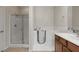 Bright bathroom includes walk-in tub, separate shower, and stylish vanity at 1407 Wheelwright Ct, Mesquite, NV 89034