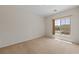 Neutral bedroom featuring a window allowing natural light to enter the room at 1407 Wheelwright Ct, Mesquite, NV 89034