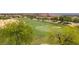 Beautiful golf course view with lush green fairways and trees at 1407 Wheelwright Ct, Mesquite, NV 89034