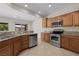 Kitchen showcasing stainless steel appliances, granite countertops, and ample cabinet space at 1407 Wheelwright Ct, Mesquite, NV 89034