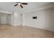 Large living area with tile flooring, an open floor plan and neutral colored walls at 1407 Wheelwright Ct, Mesquite, NV 89034