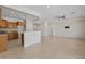 Spacious living area showcases tile floors, recessed lighting, and an open flow to the kitchen at 1407 Wheelwright Ct, Mesquite, NV 89034