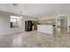 Bright kitchen area with stainless steel appliances and large windows overlooking the yard at 1408 Reebok Ter, Henderson, NV 89014