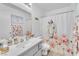 Bright bathroom with vanity, artistic shower curtain, and coordinating decor at 1476 Evening Song Ave, Henderson, NV 89012
