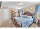 Comfortable bedroom with a spacious bed, carpet flooring and natural light from the window at 1476 Evening Song Ave, Henderson, NV 89012
