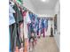 Large walk-in closet with extensive hanging space and well-organized storage solutions at 1476 Evening Song Ave, Henderson, NV 89012