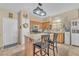 Spacious kitchen featuring granite countertops, stainless steel appliances, and an island with seating at 1476 Evening Song Ave, Henderson, NV 89012