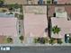 Birds eye view of a single Gathering home with well maintained front yard and desert landscaping at 1728 Crystal Chimes Dr, Las Vegas, NV 89106