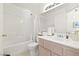 Clean bathroom featuring a shower-tub combination, single vanity, and neutral decor at 1728 Crystal Chimes Dr, Las Vegas, NV 89106
