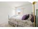Cozy bedroom features a comfortable bed with large window and ample closet space at 1728 Crystal Chimes Dr, Las Vegas, NV 89106