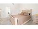 Serene bedroom with light wood furniture, a cozy bed, and a peaceful atmosphere at 1728 Crystal Chimes Dr, Las Vegas, NV 89106