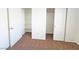 Bedroom closets offer ample storage space with shelving and sliding doors at 1951 Teepee Rd, Pahrump, NV 89048