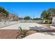Private basketball court surrounded by beautiful landscaping, providing a great recreational space at 2250 Bowie Cir, Henderson, NV 89014