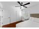 Cozy bedroom with wood floors, ceiling fan, white trim and natural light at 2250 Bowie Cir, Henderson, NV 89014