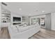 Stylish living room featuring a fireplace, built-in shelving, and sliding doors to the backyard at 2250 Bowie Cir, Henderson, NV 89014