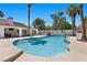 Inviting backyard pool and patio with a hot tub, basketball court, and a covered patio area at 2250 Bowie Cir, Henderson, NV 89014