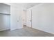 Well-lit, neutral bedroom with closet, carpet floors, and white walls, offering a simple and inviting space at 2501 Indigo Mountain St, Henderson, NV 89044