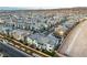 An aerial view of the 2699 Chance Canyon St neighborhood showcasing a densely populated, modern community with mountain views at 2699 Chance Canyon St, Henderson, NV 89044