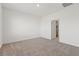 This spacious bedroom with plush carpet, closet, and neutral palette offers a relaxing retreat at 2727 Avril Point St, Las Vegas, NV 89156