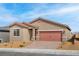 Charming single-story home with a well-manicured yard and appealing desert landscaping at 2727 Avril Point St, Las Vegas, NV 89156