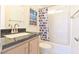 Bright bathroom with granite vanity, neutral colors, and shower at 275 Vegas Dr, Goodsprings, NV 89019