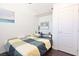 Inviting bedroom with dark wood floors, a queen bed, and light wall décor at 275 Vegas Dr, Goodsprings, NV 89019