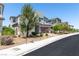 Contemporary two-story home with desert landscaping and a two-car garage at 298 Grant Ridge Dr, Henderson, NV 89012
