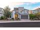 Contemporary two-story home boasting clean lines, neutral colors, and professional landscaping at 298 Grant Ridge Dr, Henderson, NV 89012