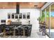 Modern kitchen with a large marble island, white cabinets, and stainless steel appliances at 298 Grant Ridge Dr, Henderson, NV 89012