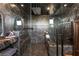 Luxurious marble shower featuring dual shower heads and built-in bench seating at 298 Grant Ridge Dr, Henderson, NV 89012