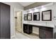 Bathroom featuring double sinks, white counters, and access to the walk-in closet at 313 Vista Glen St, Las Vegas, NV 89145