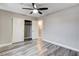 Bedroom with modern gray wood-look flooring and closet at 313 Vista Glen St, Las Vegas, NV 89145