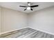 Bedroom with gray wood-look flooring and ceiling fan at 313 Vista Glen St, Las Vegas, NV 89145
