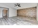 Open bedroom features a decorative accent wall, ceiling fan, and lots of natural light at 313 Vista Glen St, Las Vegas, NV 89145