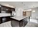 Spacious kitchen features a large island, stainless steel appliances, and open floor plan at 313 Vista Glen St, Las Vegas, NV 89145