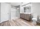 Bright bathroom with double vanity, shower, and tile floors at 3188 Via Da Vinci, Henderson, NV 89044