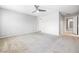 Spacious bedroom featuring plush carpet and ceiling fan at 3188 Via Da Vinci, Henderson, NV 89044