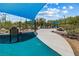 Community playground with shade structure, play equipment, and accessible pathways at 3188 Via Da Vinci, Henderson, NV 89044