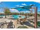 Inviting community pool area with ample seating and shaded amenities at 3188 Via Da Vinci, Henderson, NV 89044