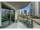 Relax on the balcony with stunning views of the surrounding cityscape and lush landscaping at 322 Karen Ave # 308, Las Vegas, NV 89109