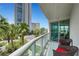 Enjoy city views from this inviting balcony with seating area at 322 Karen Ave # 308, Las Vegas, NV 89109