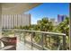 Enjoy views from this condo balcony overlooking landscaping and other buildings at 322 Karen Ave # 308, Las Vegas, NV 89109