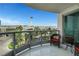 Relaxing balcony featuring a seating area and captivating views of the cityscape at 322 Karen Ave # 308, Las Vegas, NV 89109