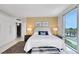 Bedroom featuring a comfortable bed, natural light from a window, and closet at 322 Karen Ave # 308, Las Vegas, NV 89109