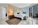 Bedroom with a queen bed, natural light and a balcony at 322 Karen Ave # 308, Las Vegas, NV 89109