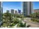 Beautiful landscaping surrounds this condo building with palm trees and manicured gardens at 322 Karen Ave # 308, Las Vegas, NV 89109