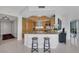 Kitchen features sleek granite countertops, stainless steel appliances, and eat-in bar seating at 322 Karen Ave # 308, Las Vegas, NV 89109