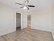 Bright bedroom features contemporary floors, a ceiling fan, a closet, and a neutral color palette at 340 Autumn Palace Ct, Las Vegas, NV 89144